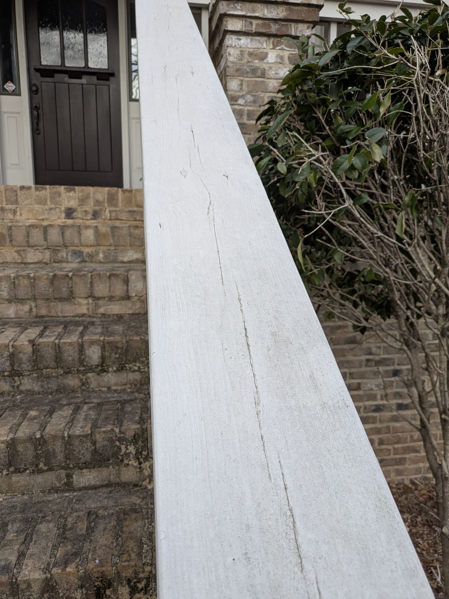 Newly painted white trim on an Athens GA cottage exterior